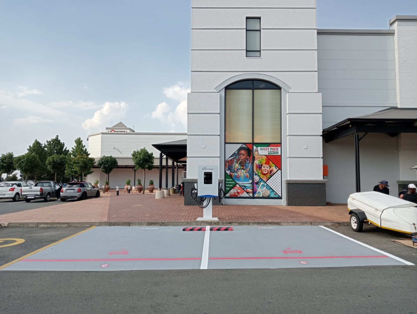 EV charging station outside a shopping centre store